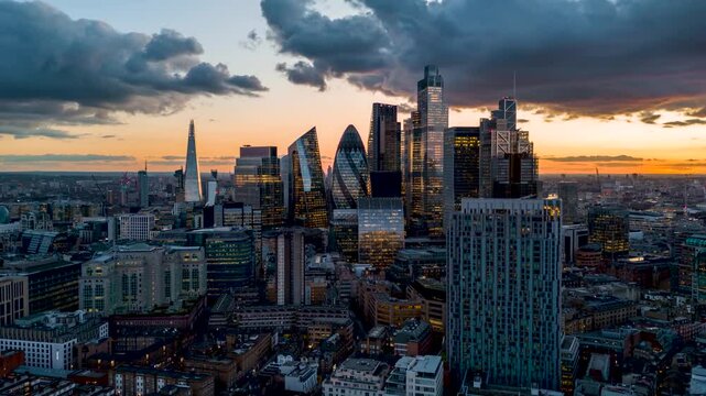 Aerial sunset hyper time lapse view of the modern skyline at the City of London, England