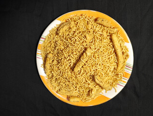 Sev - Crispy Bhujia plate on black background