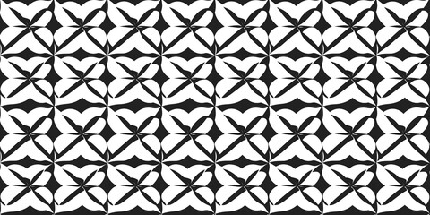 Fototapeta premium Black and white seamless floral pattern with intricate shapes and designs for modern backgrounds. pattern formula