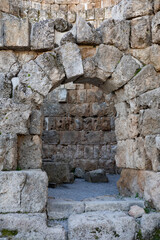 Ancient stone wall with an arch