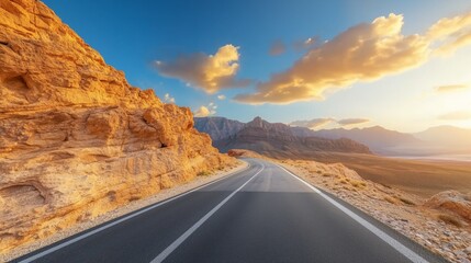 Serene Desert Road with Grand Mountain View at Sunset