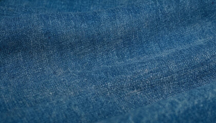 Naklejka premium Blue denim jeans fabric texture background