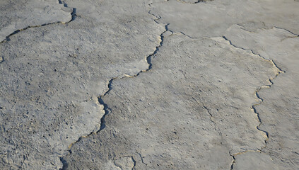 Cracked grey concrete surface