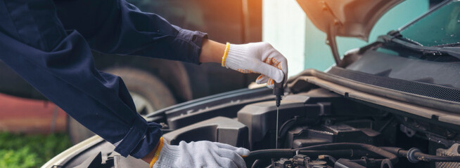 Banner Man hands fixing Car machinery vehicle mechanical service. Mechanic man hands repairing car shop. Panorama open vehicle hood checking up auto mobile. Car maintenance engineer with copy sapce
