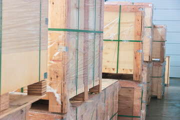 Plywood packaging on pallets in polyethylene film