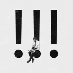 Man in formal attire sitting on punctuation marks while working on laptop. Concept of urgency,...