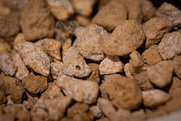 Brown gravel stones closeup texture view