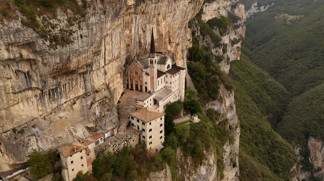 Sanctuary of Madonna della Corona: suspended between heaven and earth, where faith meets the majesty of nature. Italy 