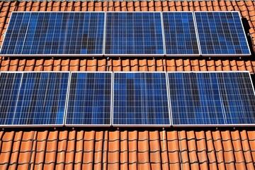 Solar panels installed on a tiled roof capturing sunlight efficiently