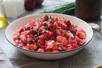 A bowl with Vinegret salad, a typical Russian dish	