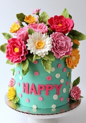 A beautiful floral cake decorated with a bouquet of colorful flowers, including peonies, daisies, and carnations, atop a light teal base with pink polka dots and the word "HAPPY" in pink letters.
