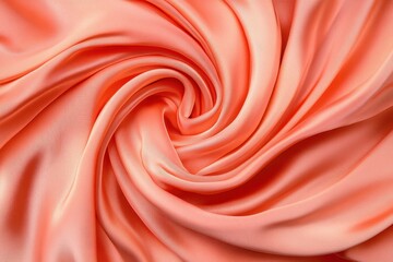 Obraz premium Soft coral silk fabric swirling elegantly, showcasing delicate texture and vibrant hue