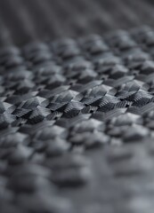 Obraz premium Close up of carbon fiber composite material, industrial background, selective focus. Carbon Fiber Weave Texture