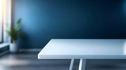 A sleek, modern workspace featuring a minimalist table with a calming blue wall and natural light from the window.