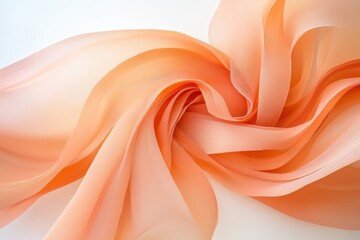 Obraz premium Soft peach fabric elegantly draped creates a gentle fluidity perfect for fashion or decor projects