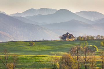View of Tatra mountains from Murzasichle, Poland village on golden hour