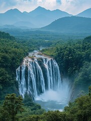 Majestic Waterfall Surrounded by Lush Green Forests and Serene Mountains Under a Cloudy Sky