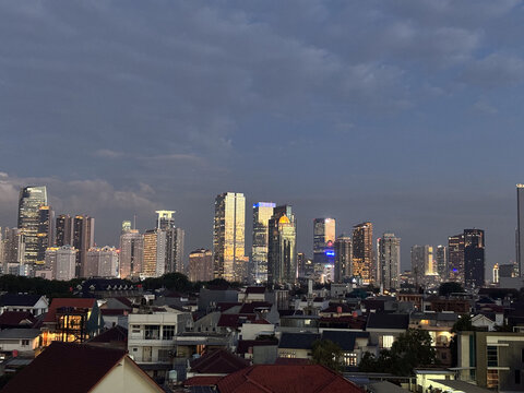 skyscrapers with a beautiful sunset sky in the background