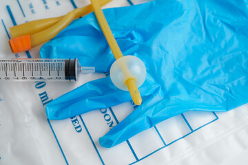 Foley catheter and urine drainage bag collect urine for disability or patient in hospital.