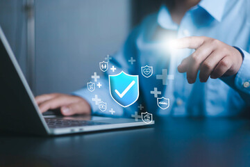 Insurance and safety protection concept. Businessman show icon in front the laptop, Certification of various types of insurance services. healthcare, investment, Car, travel, health family insurance