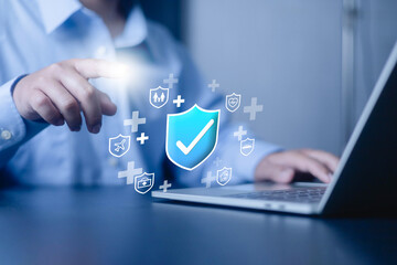 Insurance and safety protection concept. Businessman show icon in front the laptop, Certification...