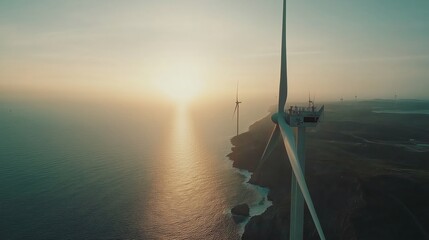 Offshore wind turbine on a coastal cliff at sunset. Concept of renewable energy, sustainability, and clean power generation.