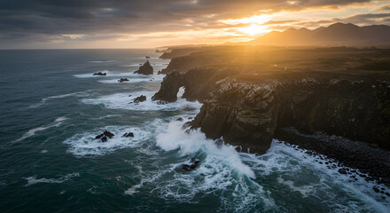 Aerial View of a Dramatic Coastline with Crashing Waves at Sunset