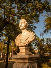 Fototapeta premium Classical marble bust in sunlit park