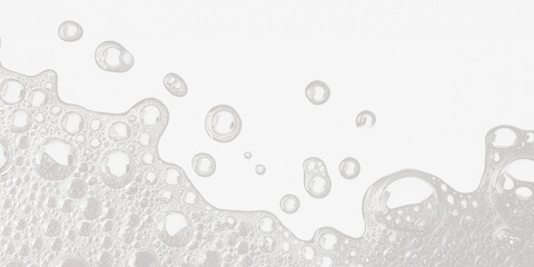 White soap bubbles and foam on transparent background, high-contrast abstract cleaning concept, macro close-up, modern texture for hygiene, detergent, and washing themes