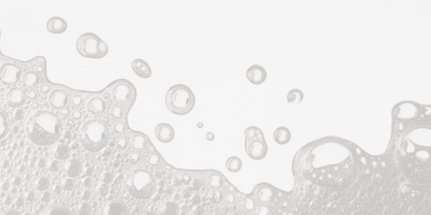White soap bubbles and foam on transparent background, high-contrast abstract cleaning concept, macro close-up, modern texture for hygiene, detergent, and washing themes