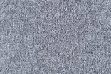 Close-up of blue and gray fabric creating a patterned fabric backdrop used as a background.