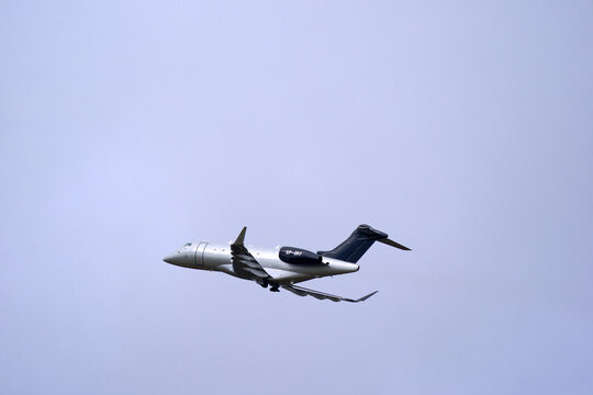 Private jet Bombardier Challenger 3500 registration SP-IRT taking off from Swiss Airport Z&uuml;rich Kloten on a cloudy winter day. Photo taken February 27th, 2025, Zurich Kloten, Switzerland.