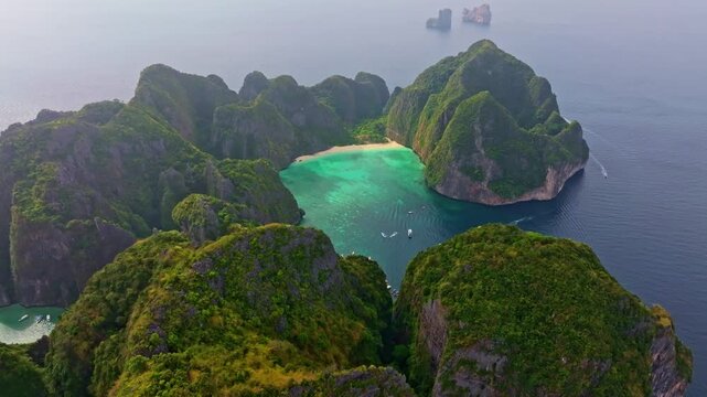 Aerial panorama of famous Phi Phi Lee island with beaches and sea. Aerial drone video