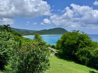 Caribbean seascape with view of a seaside mountain and tropical vegetation of Guadeloupe in the...