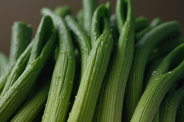 Obraz premium A Close up of a Bunch of Green Vegetables With Water Droplets on Them - Generative AI