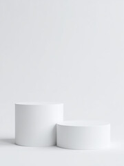 Two Cylindrical Podiums Stand On A White Background, Providing An Elegant Space For Showcasing Products And Mockups Alike.