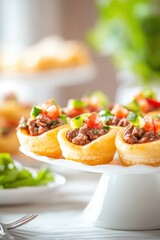 Mini Taco Bites Filled with Beef and Fresh Toppings on Stand