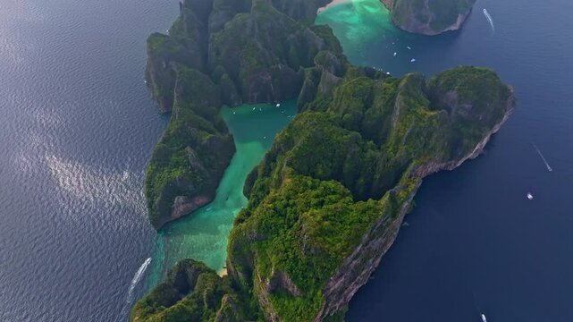Tropical Phi Phi Lee island aerial with Maya Bay and blue sea. High quality 4k footage