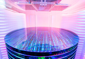 silicon Wafers in white plastic holder box used in electronics for the fabrication of integrated...