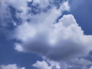 blue sky with cumulonimbus clouds