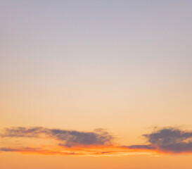 Blurred sunset sky with clouds