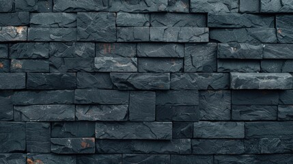 Textured dark slate stone wall