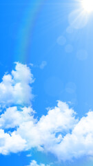 blue sky with clouds and sun rays with bokeh lights ,nature weather spring and summer landscape vertical social media background	