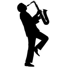 Naklejka premium Silhouette of a saxophonist playing jazz during a musical performance, standing on one leg, with the other bent at the knee, in a marching band.