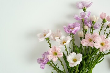 Obraz premium A Bouquet of Pink and Purple Flowers in a Vase Against a White Wall - Generative AI