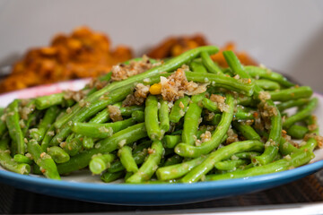 plate of stir fried green beans with garlic