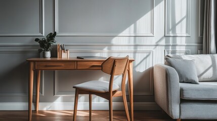 Modern desk area with sunlight streaming in