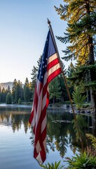 Naklejka premium American Flag Waving Over a Scenic Lake Surrounded by Tall Trees, With Calm Water Reflecting the Landscape and Warm Sunlight Illuminating the Treetops,Patriotism and National Pride on Independence Day