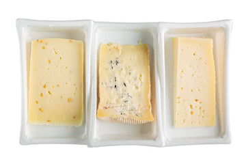Italian cheeses - caciotta with fenugreek, blue cheese and asiago in plastic trays isolated on white. Top view.