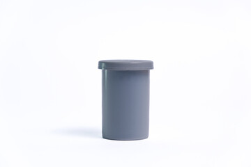plastic can for negative film isolated on white background